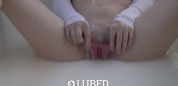  LUBED - Redhead Dolly Little takes a wet milk bath before fuck
